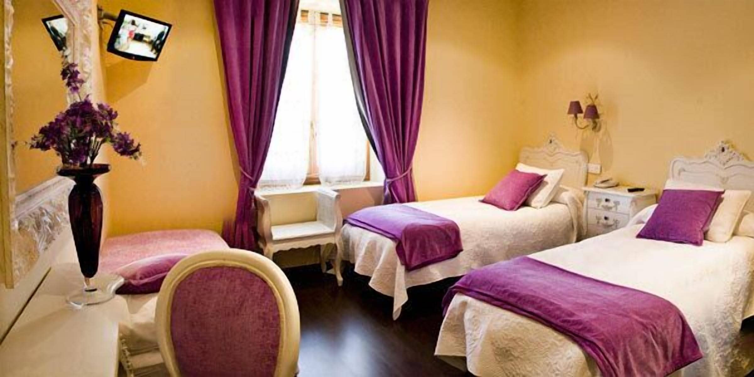 twin room | individually furnished, desk, blackout curtains, free cots/infant beds