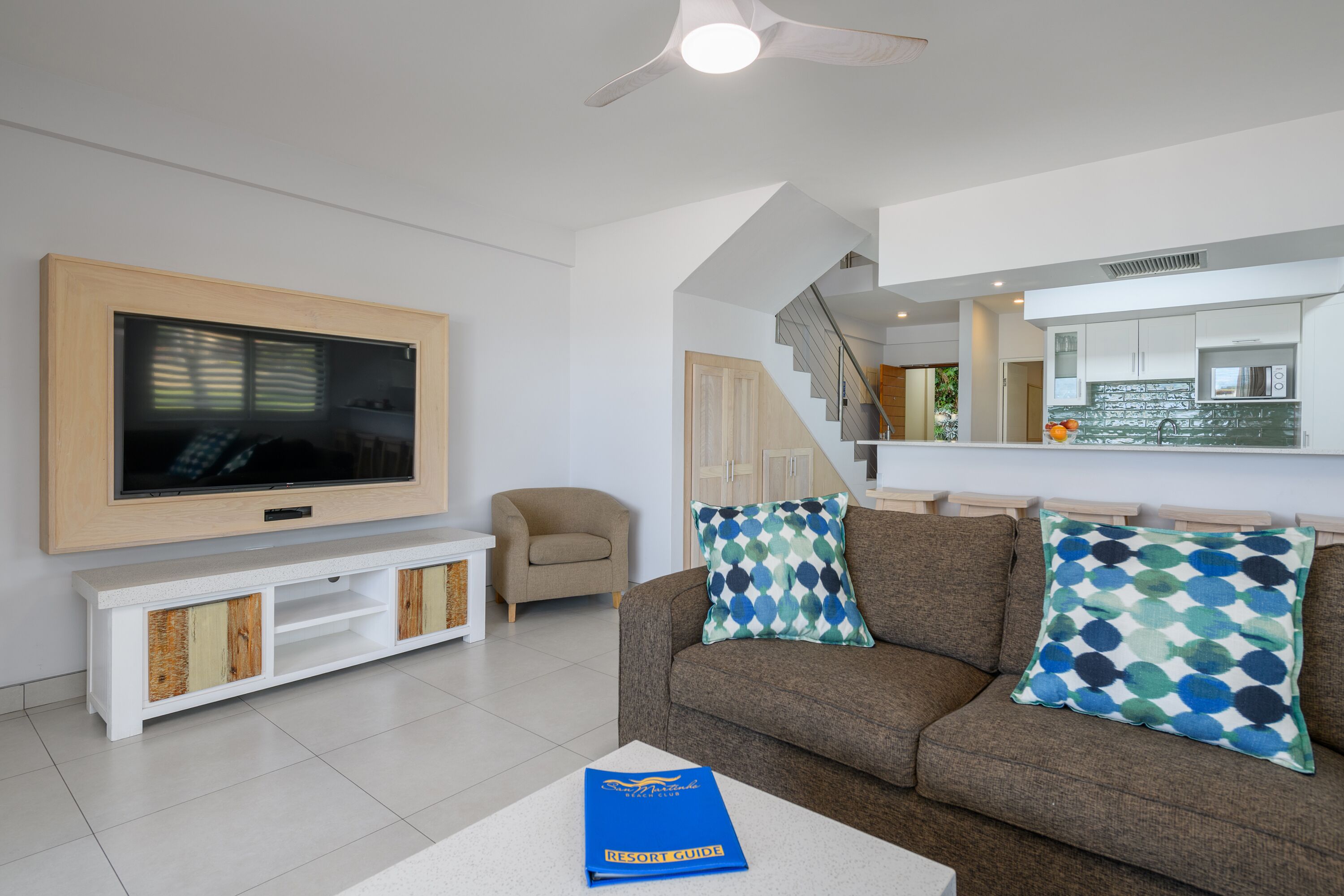 four bedroom beach front duplex apartment | living area | 42-inch flat-screen tv with satellite channels, tv, ping pong