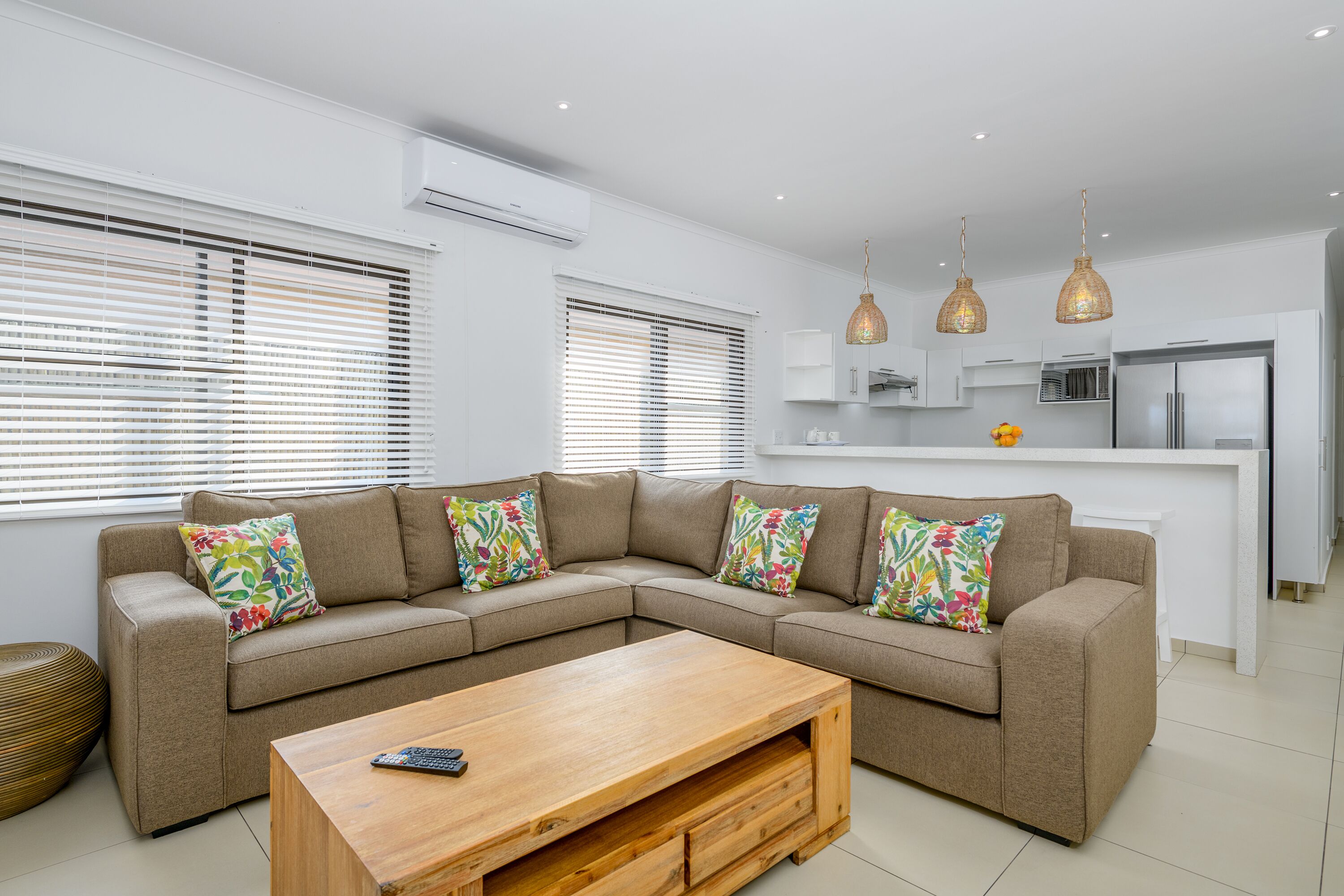 two bedroom beach front villa with splash pool | living room | 42-inch flat-screen tv with satellite channels, tv, ping pong