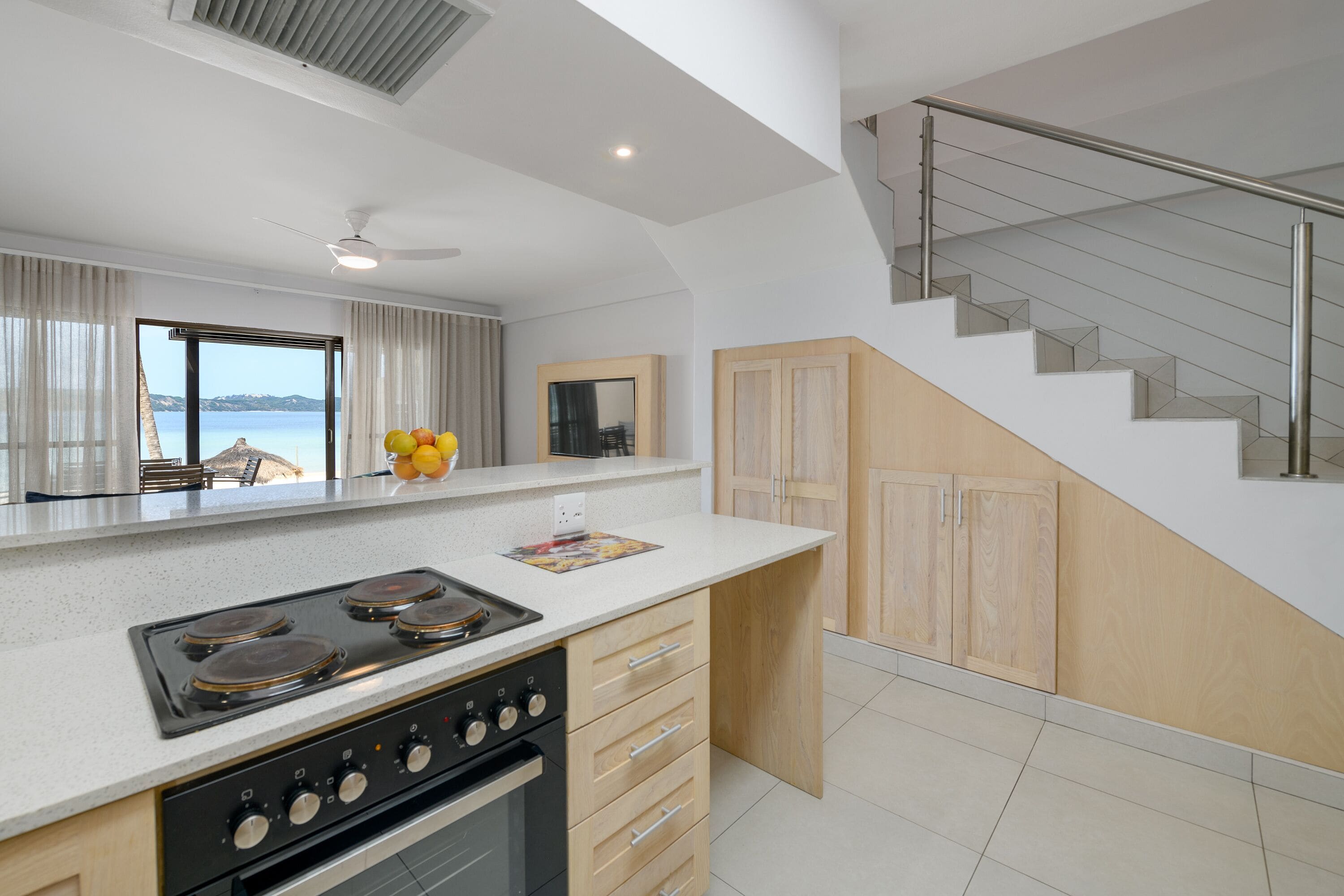 three bedroom duplex apartment with patio | private kitchen | fridge, microwave, oven, electric kettle