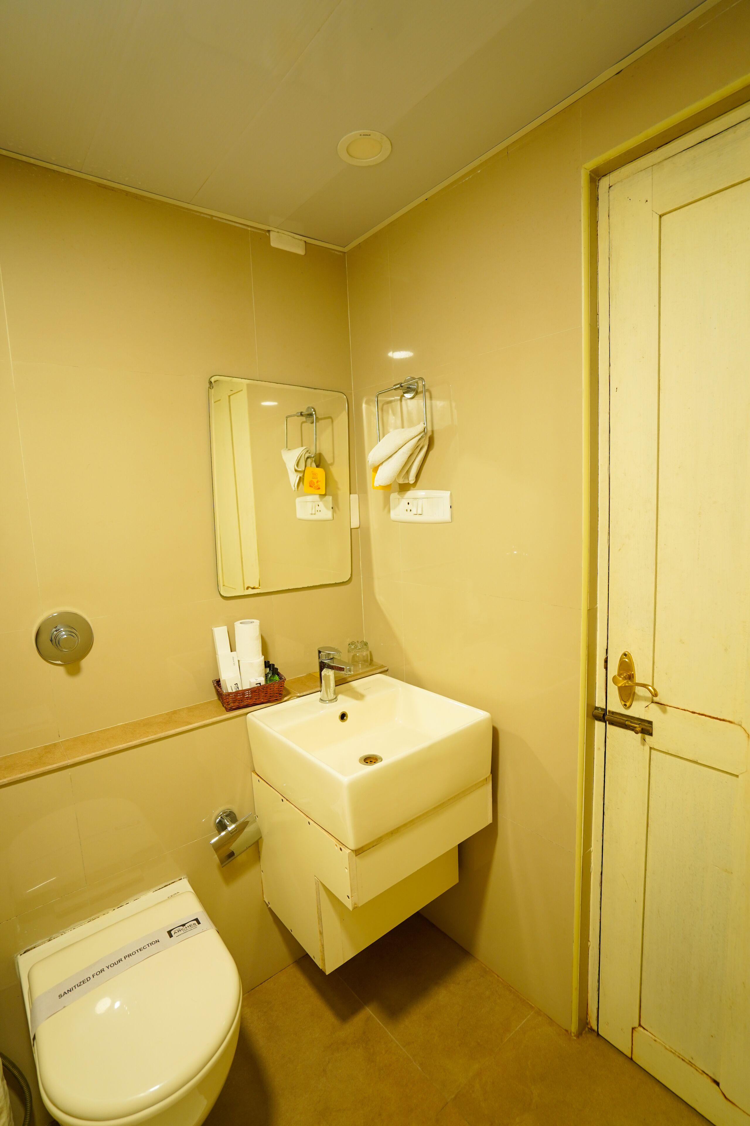 rainfall showerhead, dressing gowns, slippers, towels