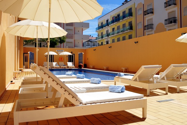 Outdoor pool, open 9:00 AM to 8:00 PM, pool umbrellas, sun loungers