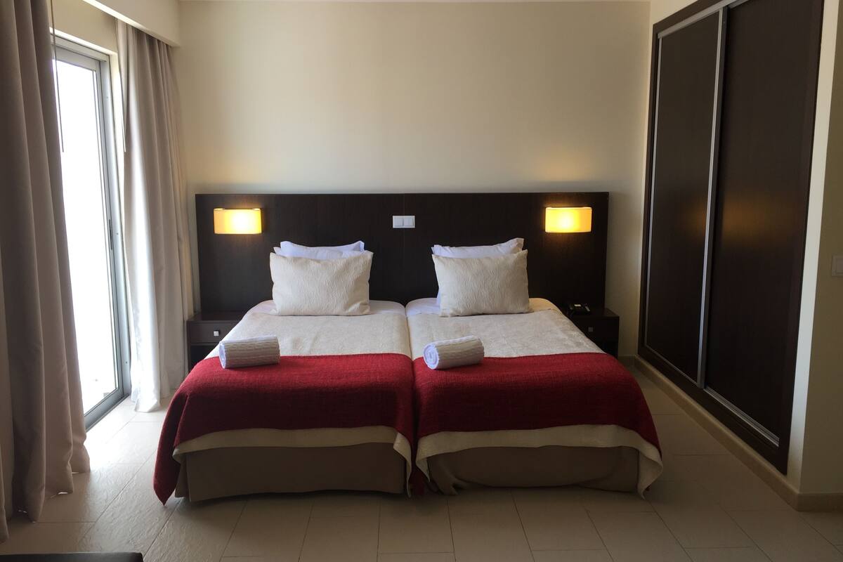 1 bedroom, desk, laptop workspace, blackout curtains