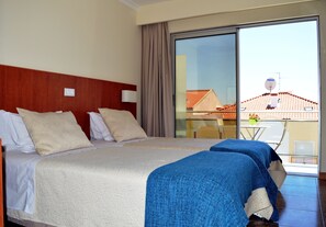 Desk, laptop workspace, blackout curtains, soundproofing