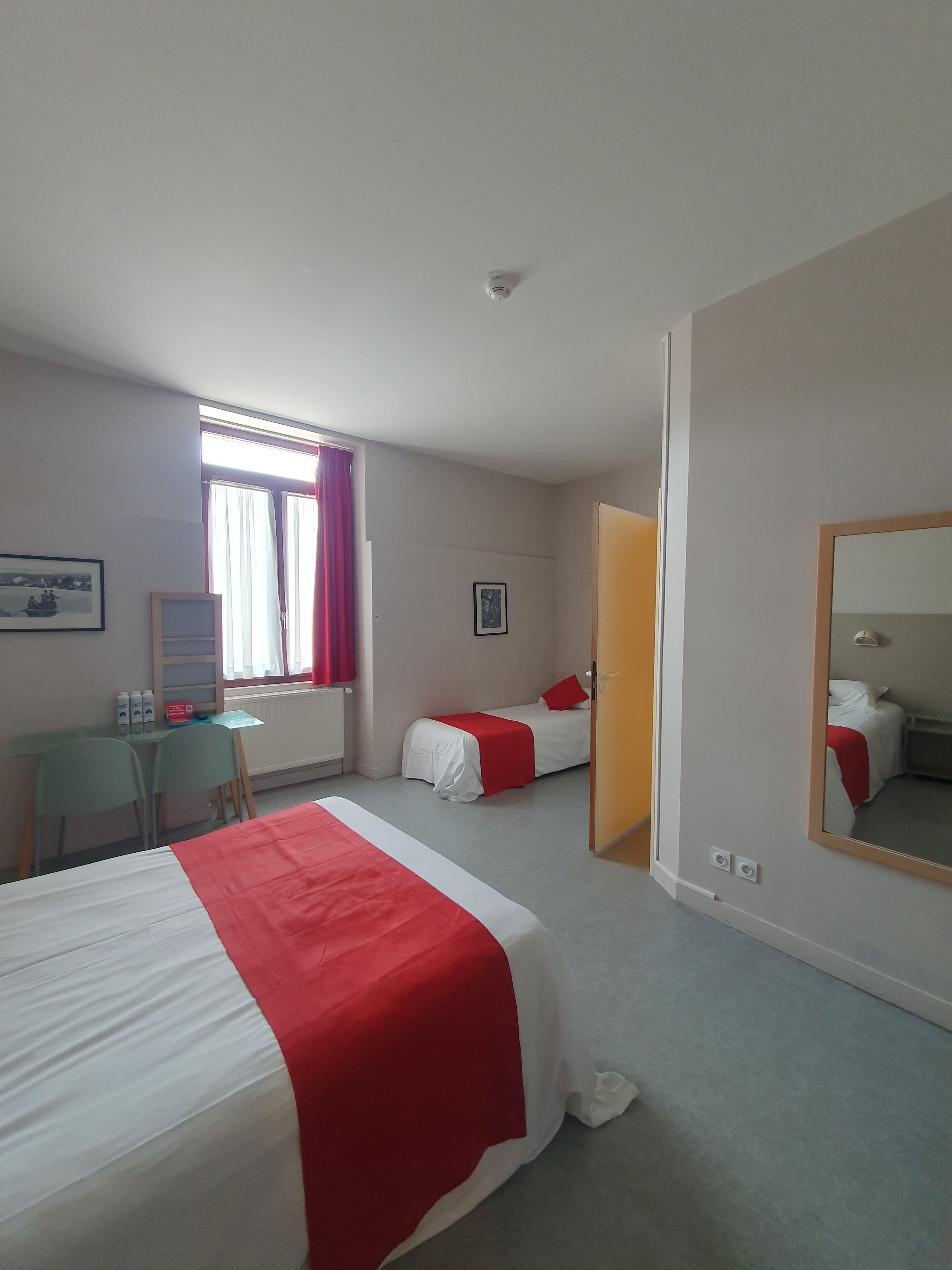 comfort triple room, courtyard view | premium bedding, desk, blackout curtains, free wifi