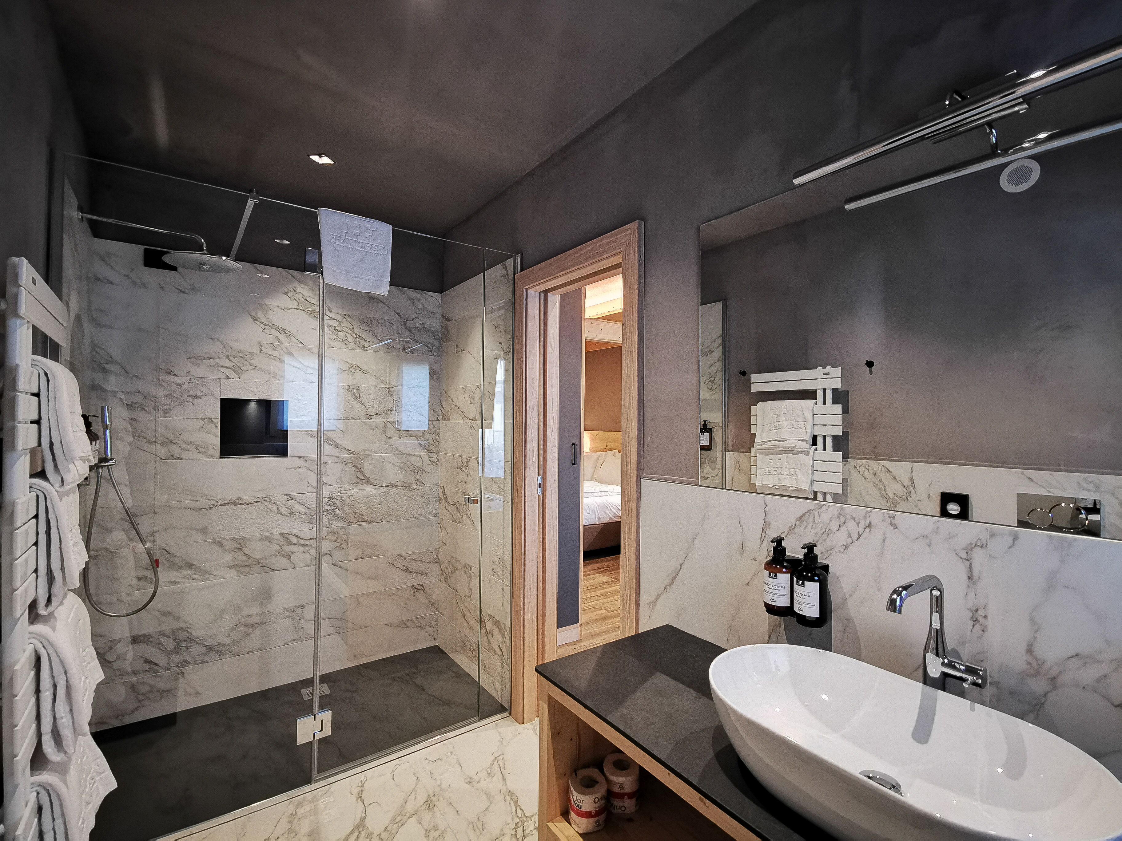 superior quadruple room | bathroom | free toiletries, hair dryer, bathrobes, bidet