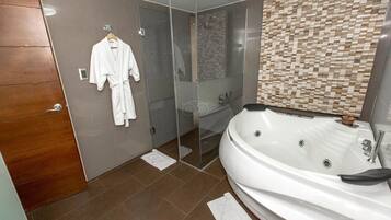 Senior Suite, 1 King Bed, City View | Bathroom | Shower, free toiletries, hair dryer, towels