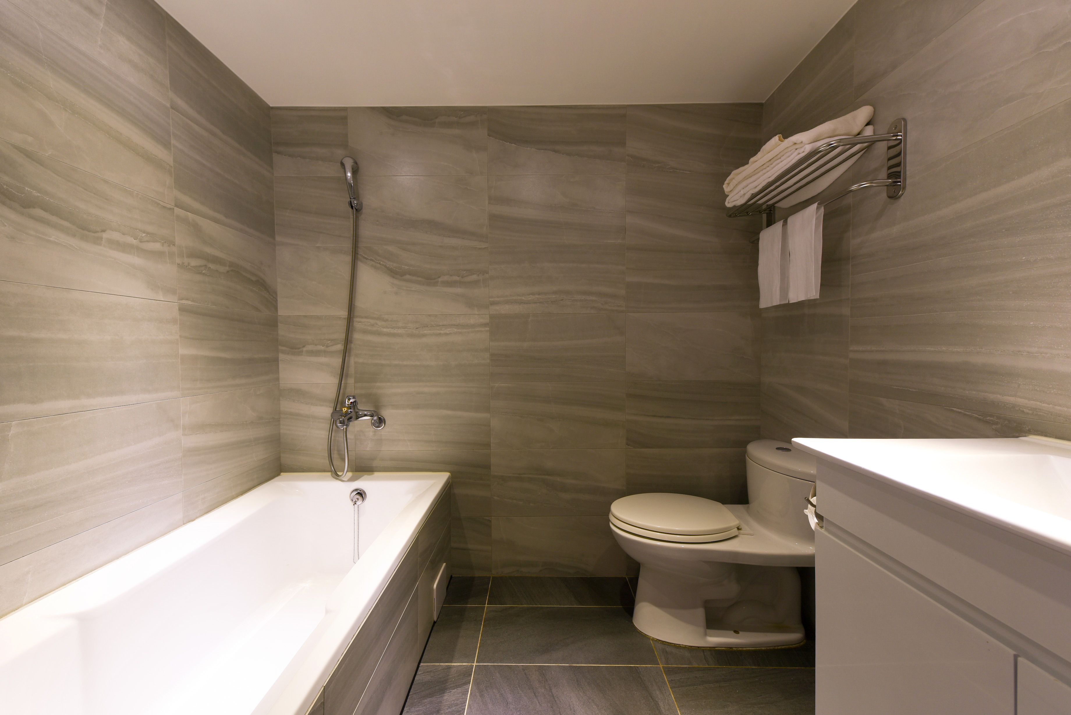 superior twin room | bathroom | free toiletries, hair dryer, slippers, towels