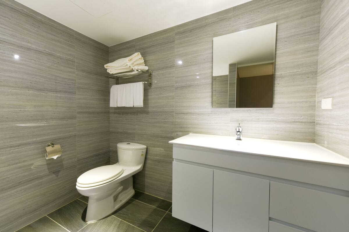 family quadruple room | bathroom | free toiletries, hair dryer, slippers, towels