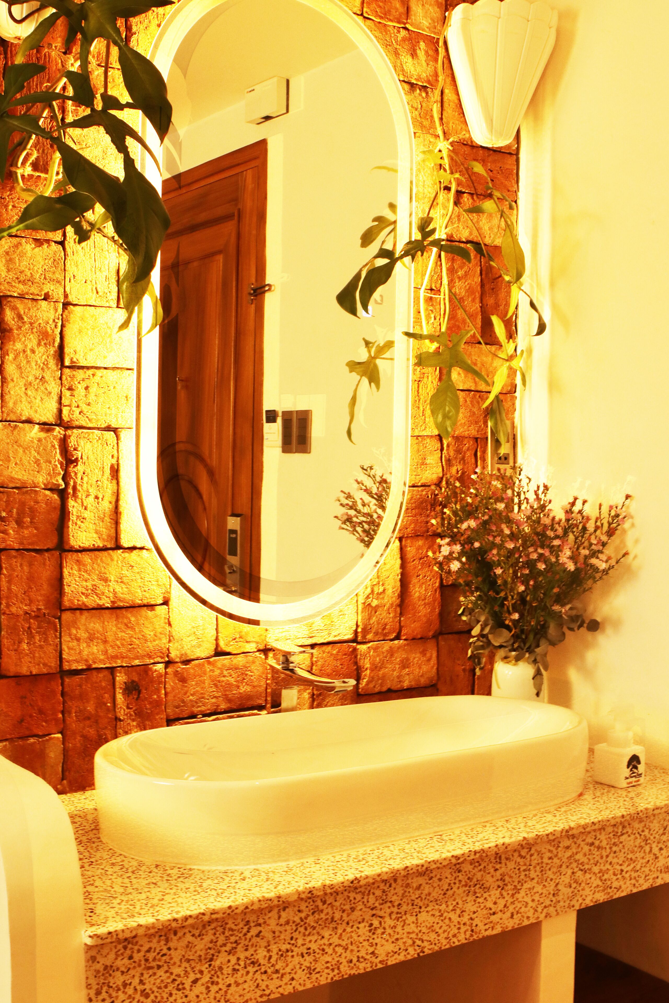 executive studio, balcony, city view | bathroom | designer toiletries, hair dryer, towels, soap