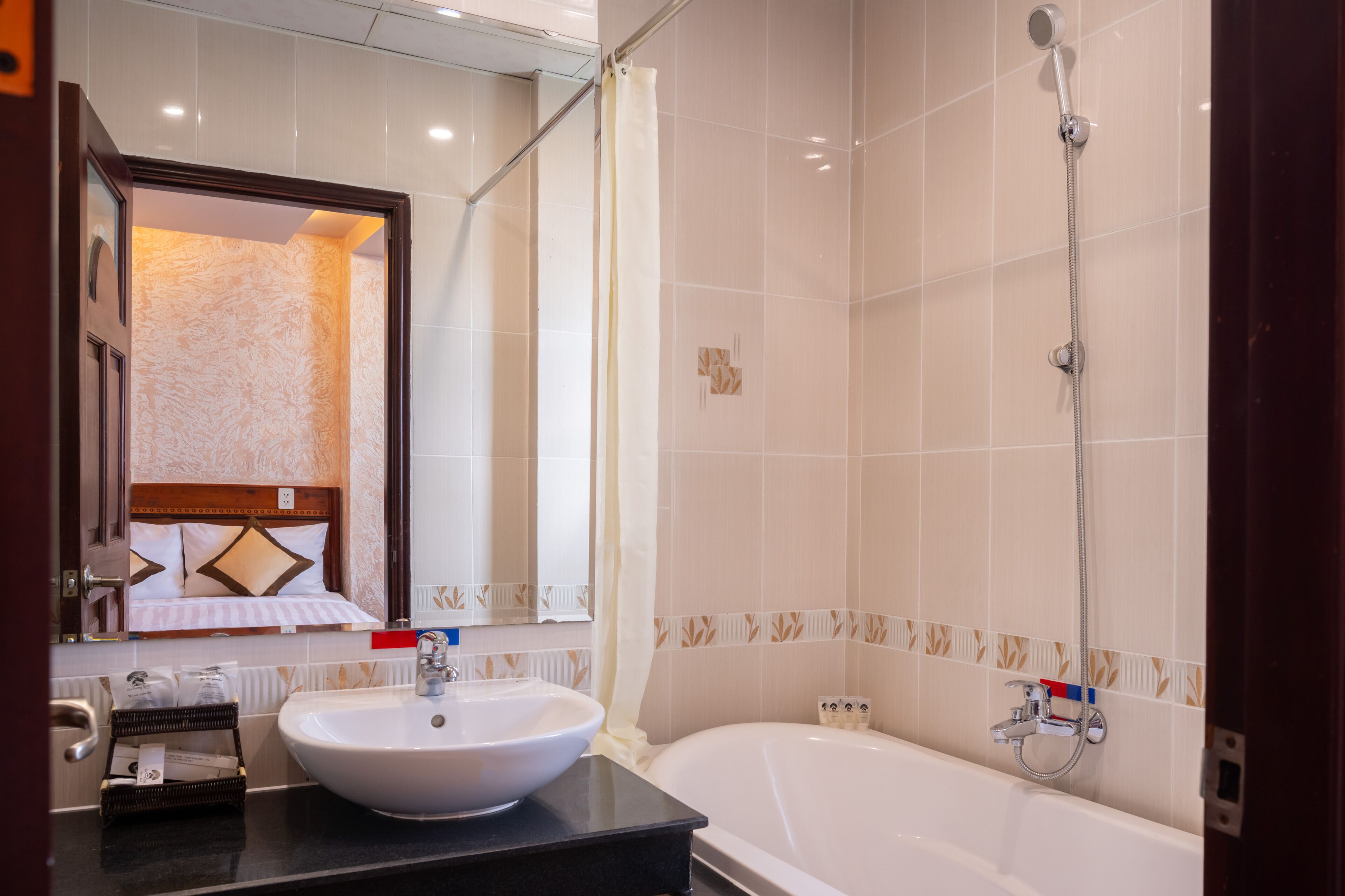 superior room | bathroom | designer toiletries, hair dryer, towels, soap