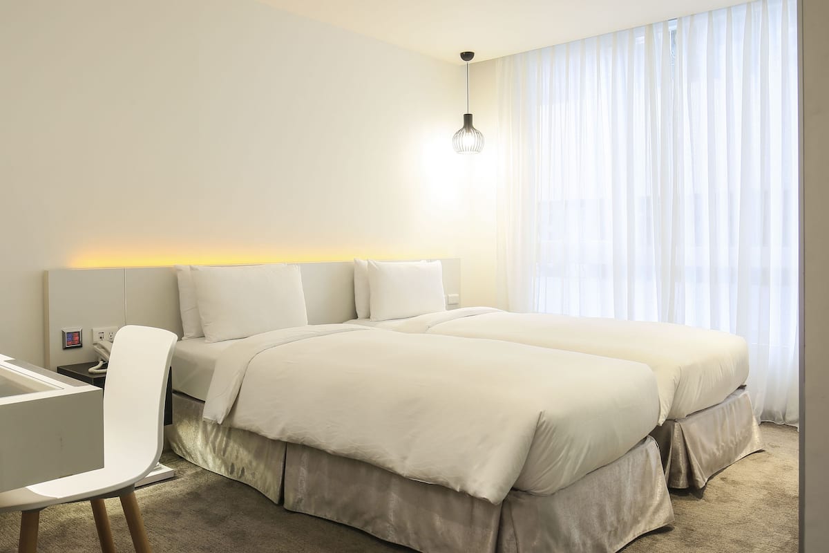Deluxe Twin kamer, 2 eenpersoonsbedden | 1 slaapkamer, luxe beddengoed, donzen dekbedden, een gratis minibar