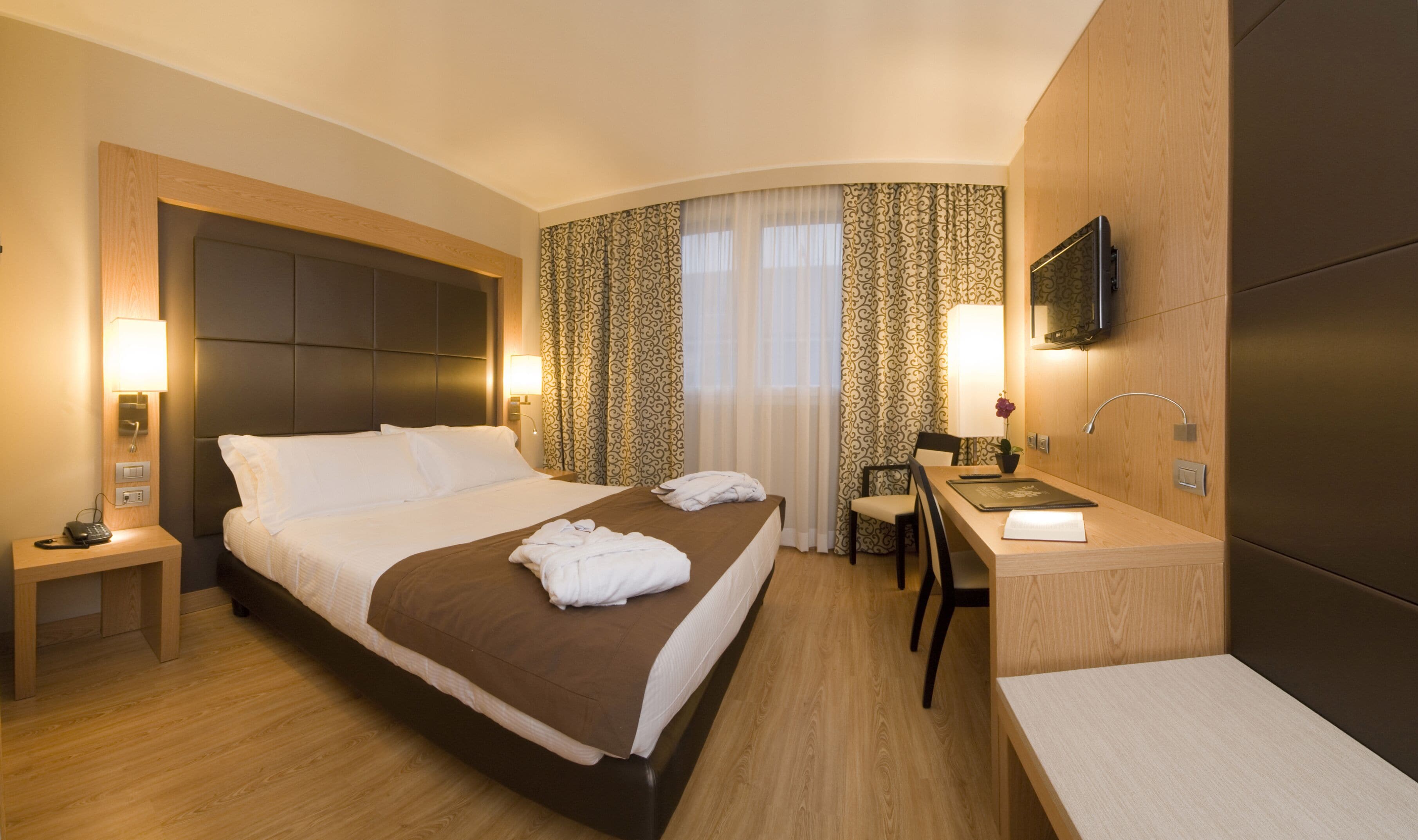 Down comforters, minibar, in-room safe, desk