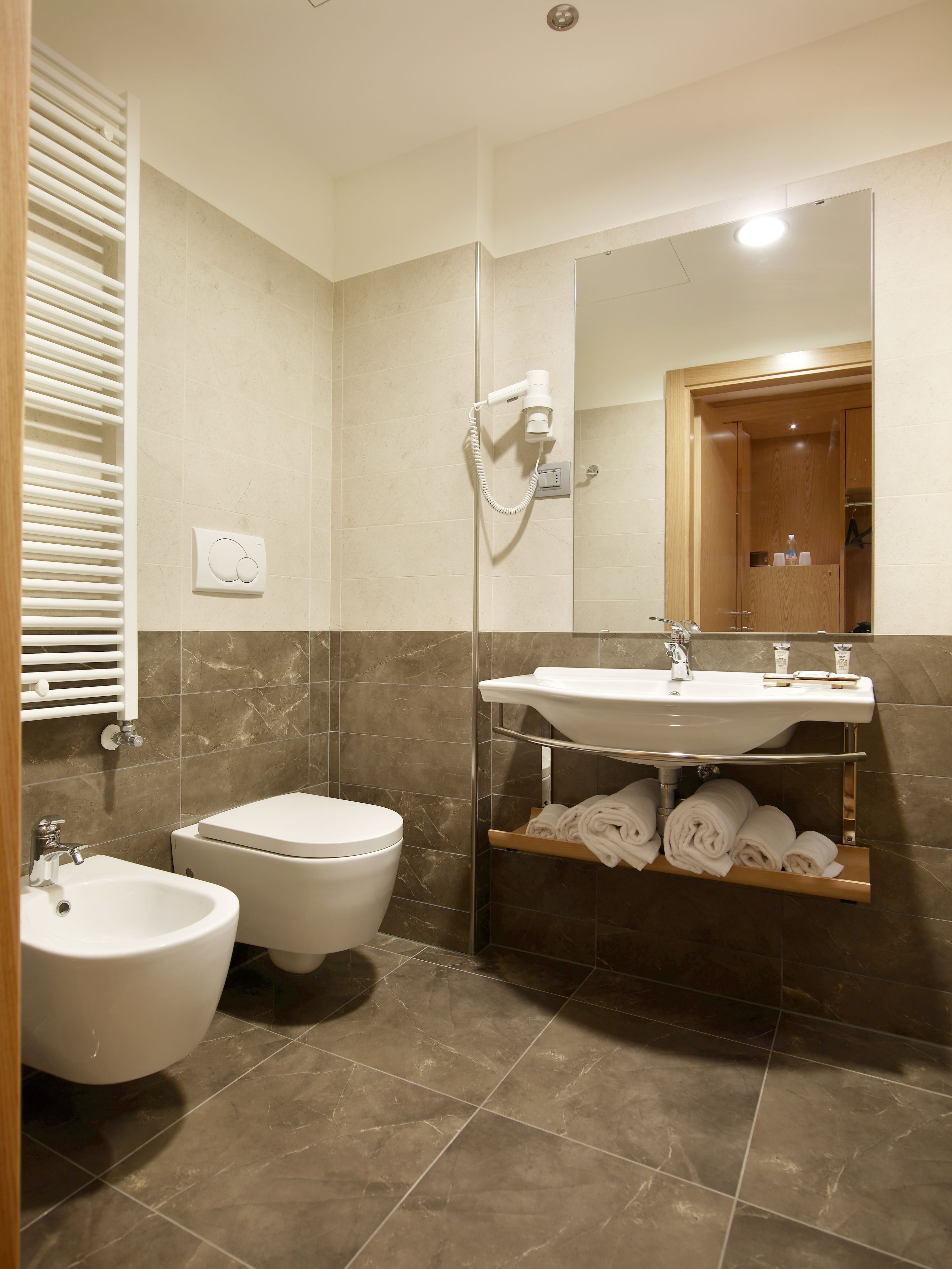 rainfall showerhead, hair dryer, bathrobes, slippers