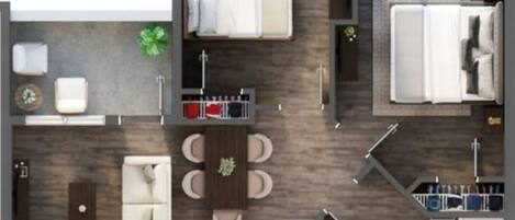 Un aménagement moderne pour une chambre d’hôtel, comprenant un lit, un coin salon, une kitchenette et une salle de bain.