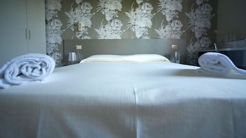 Double Room, Garden Area | In-room safe, desk, cribs/infant beds, rollaway beds