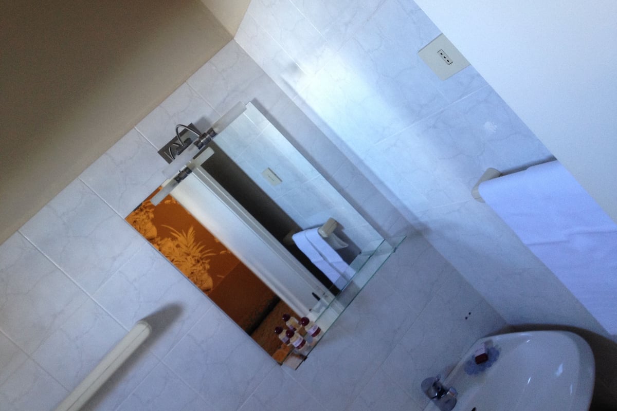 double room, garden area | bathroom sink