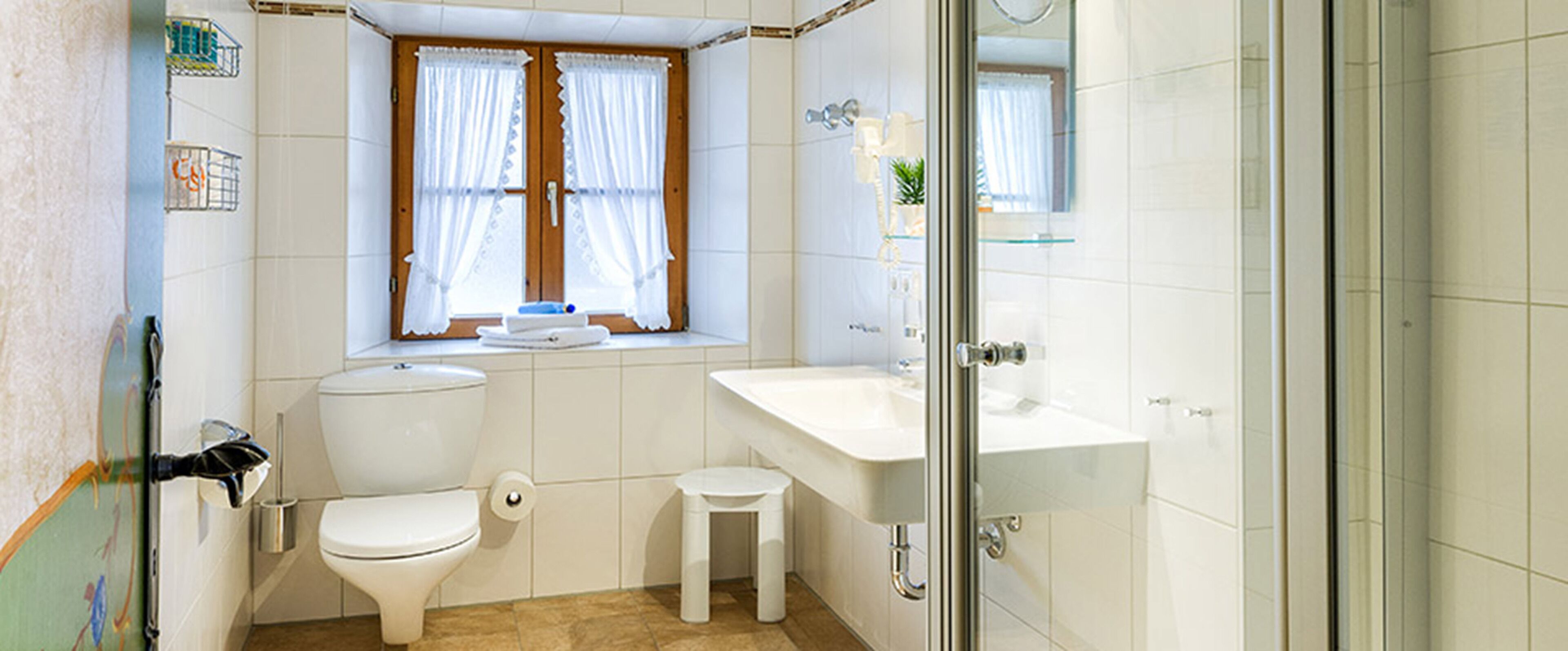 basic double room | bathroom | shower, hair dryer, towels