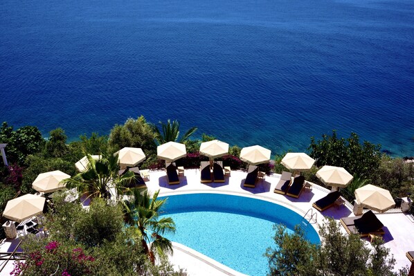 Outdoor pool, pool umbrellas, pool loungers