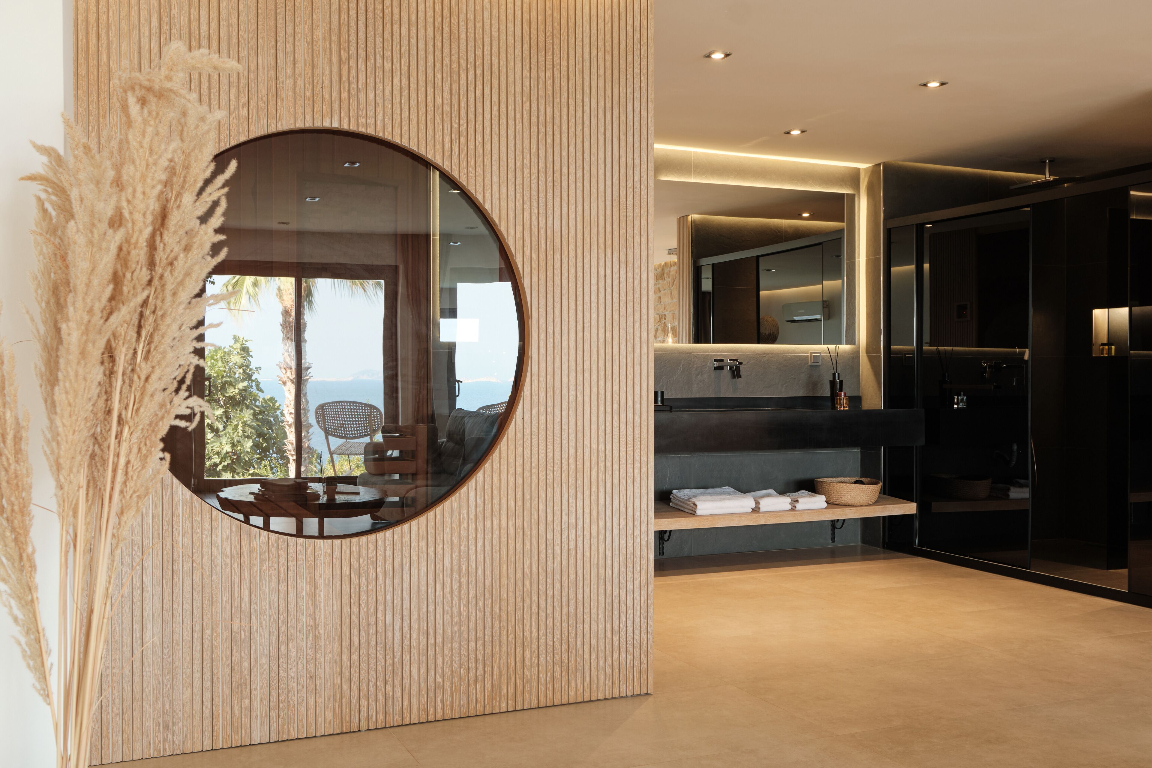 aqua suite | bathroom | hair dryer, slippers, towels