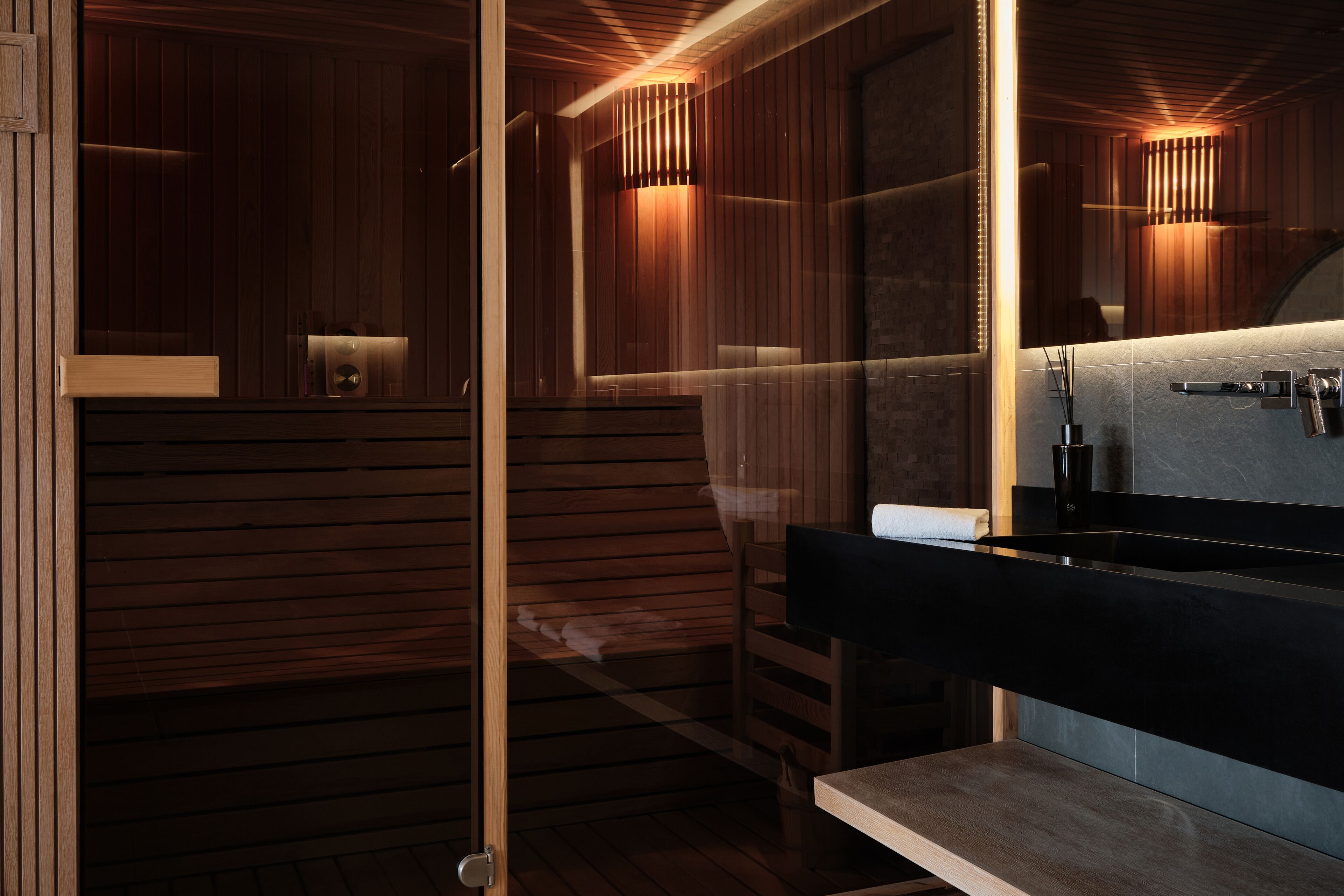 aqua suite | bathroom amenities | hair dryer, slippers, towels