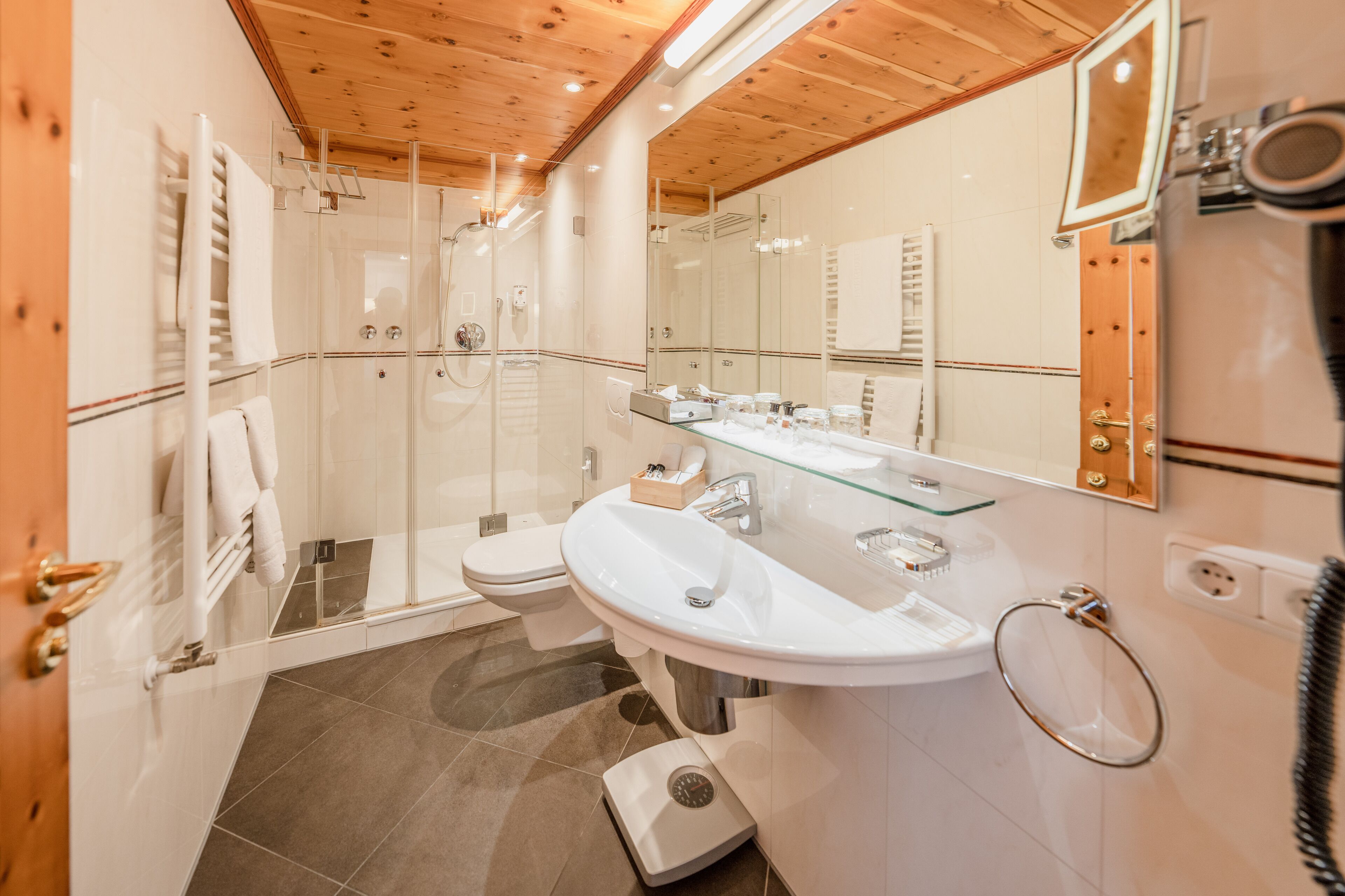 shower, eco-friendly toiletries, hair dryer, bathrobes