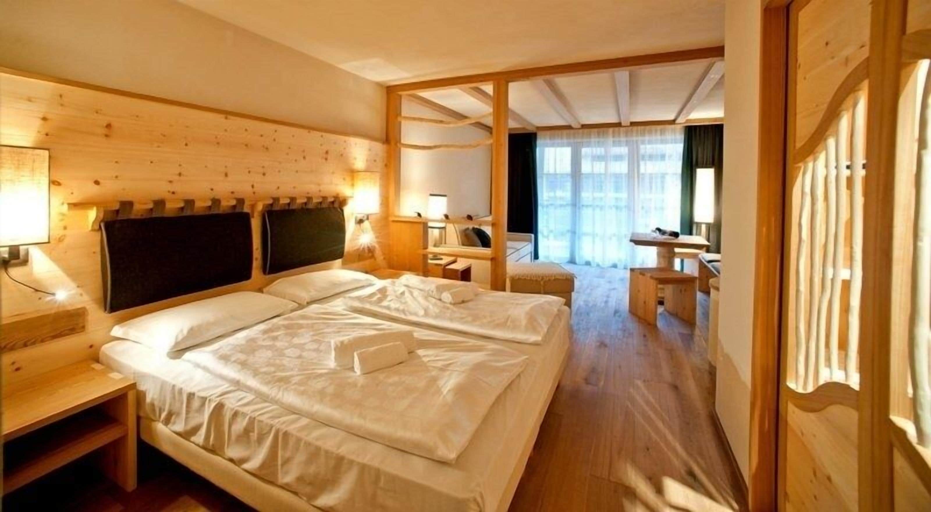 Standard Double Room (Saslong) | Premium bedding, down comforters, memory foam beds, minibar