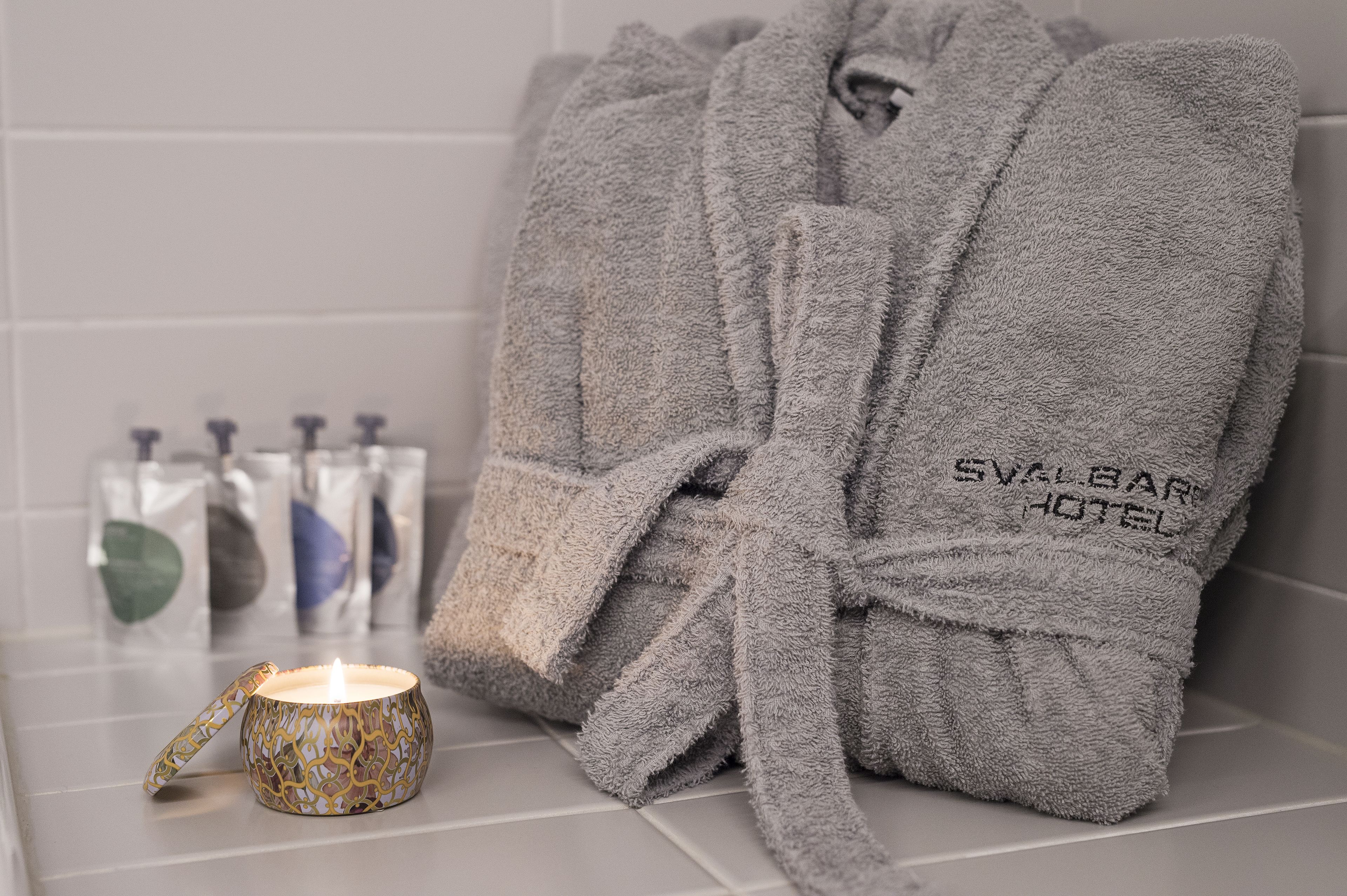 spring water bathtub, hair dryer, towels