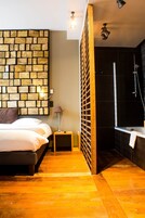 Junior Suite | Premium bedding, minibar, in-room safe, individually decorated