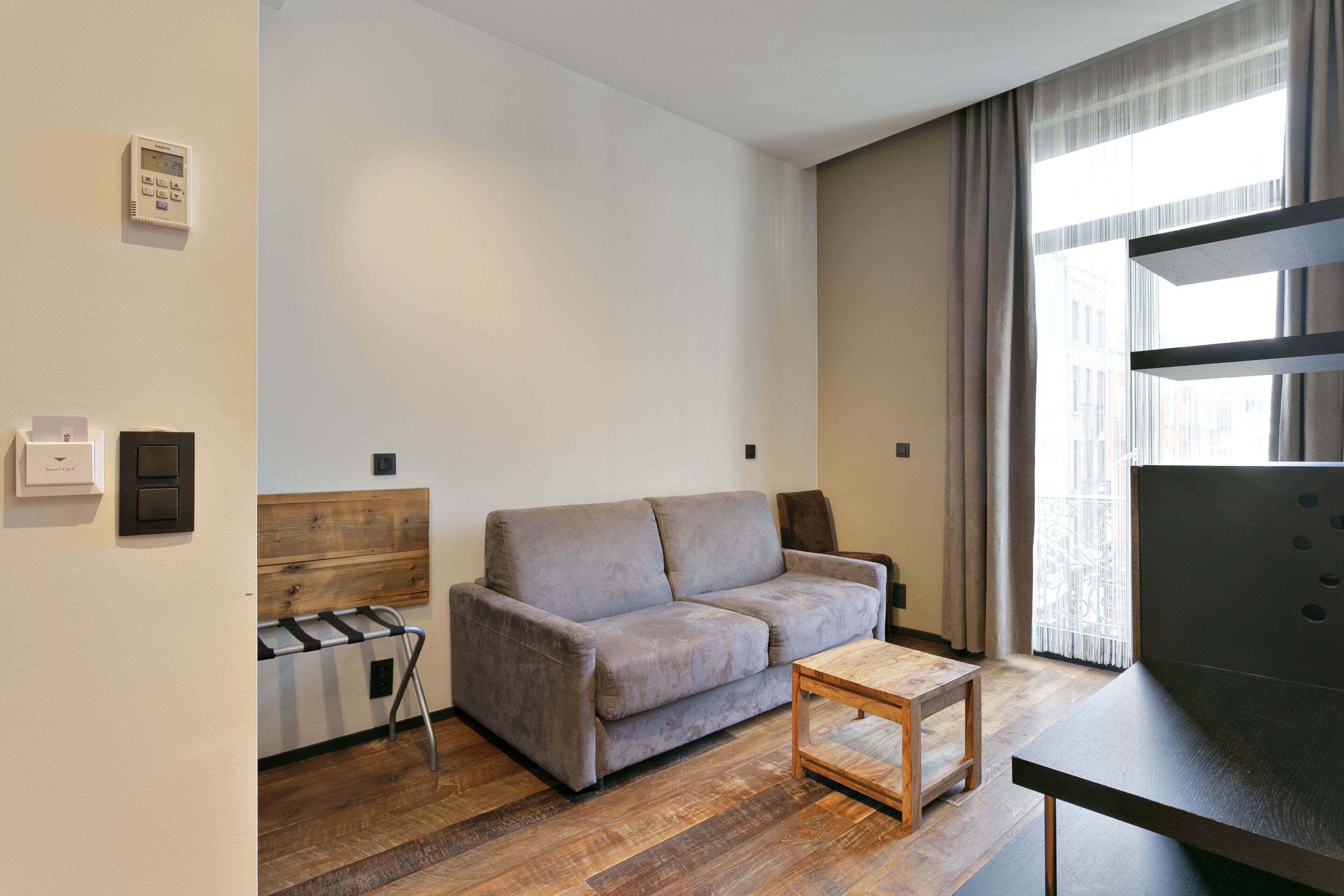 junior suite | living area | flat-screen tv