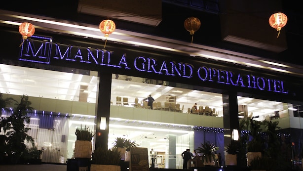 The Manila Grand Opera Hotel entrance with a modern design, featuring a prominent sign and decorative lanterns. - Manila Grand Opera Hotel (Manila)