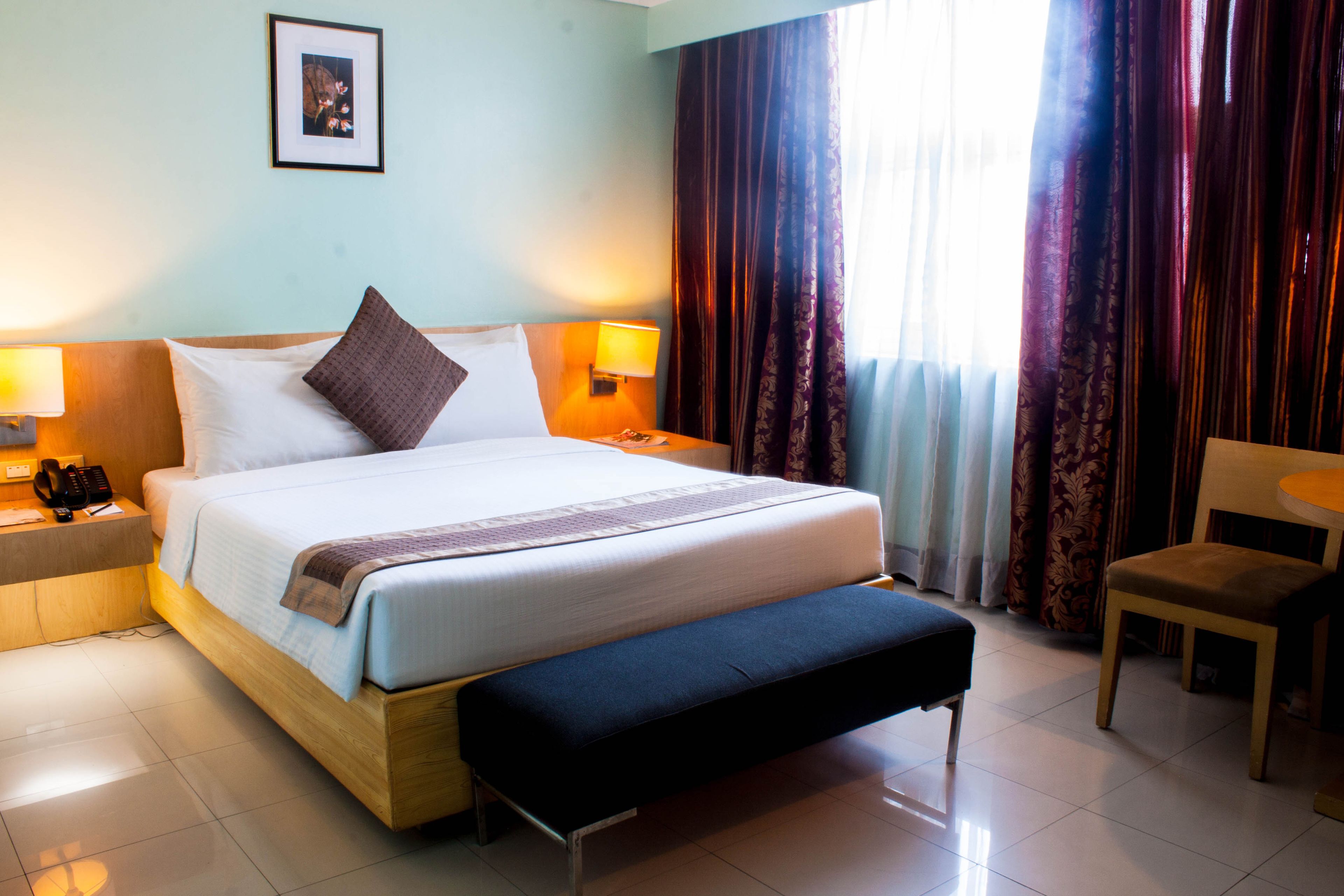 Premium bedding, down comforters, in-room safe, desk