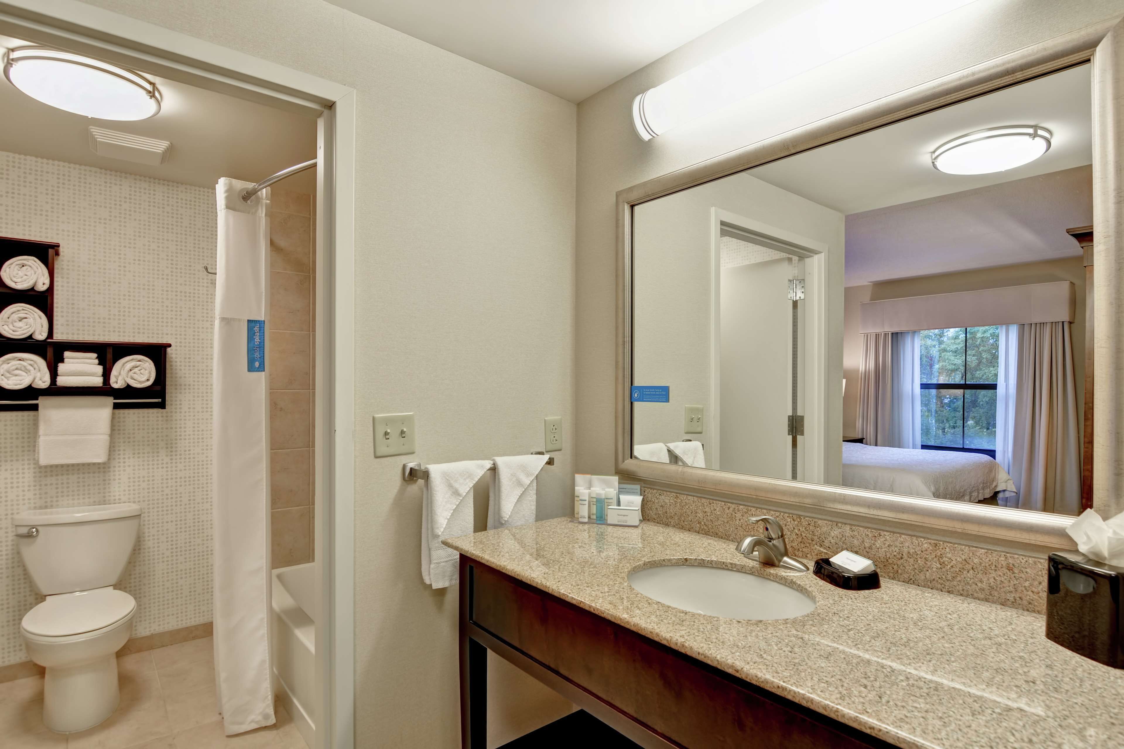 king studio suite | bathroom | free toiletries, hair dryer, bathrobes, towels
