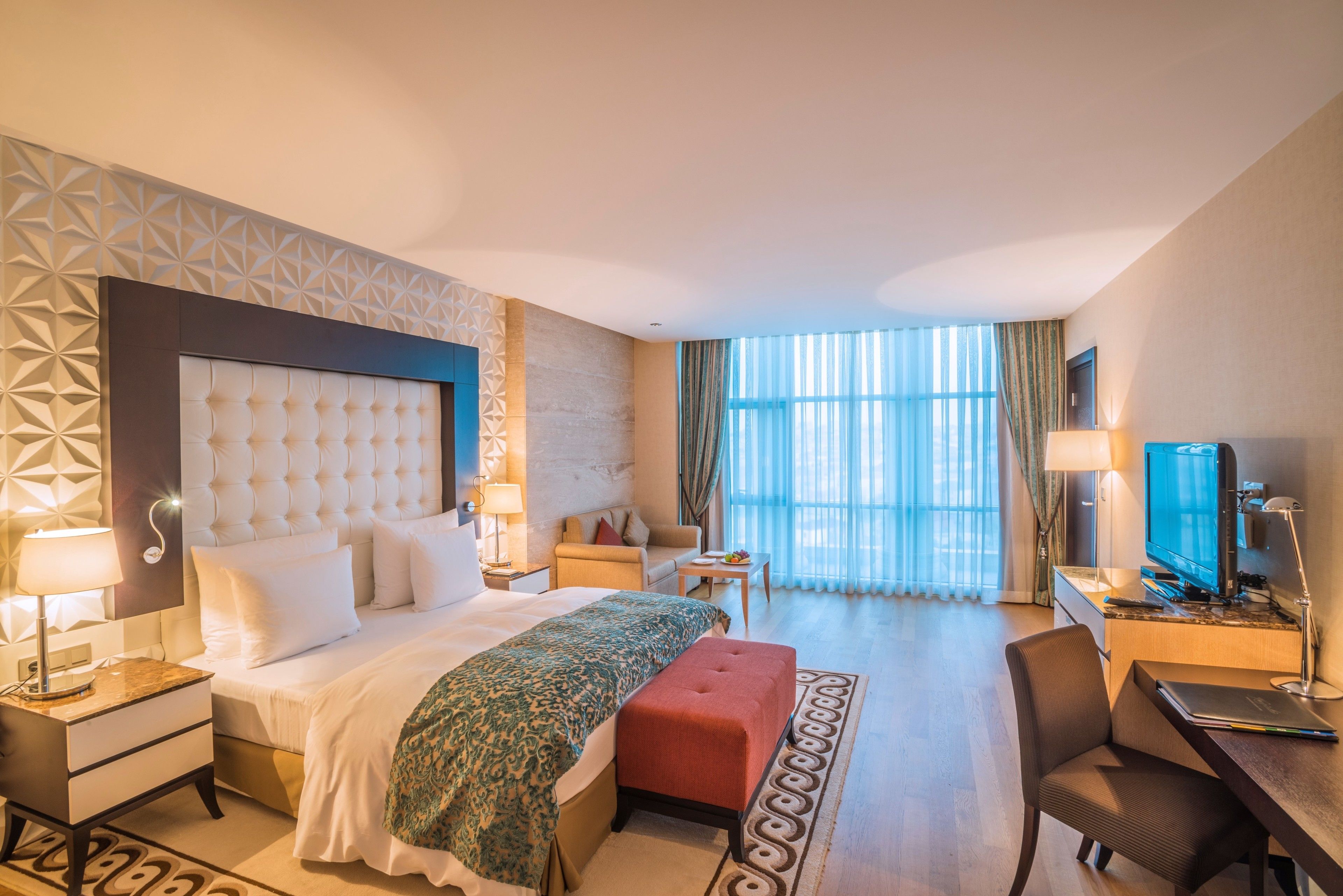 Deluxe Room, 1 King Bed, City View (Premium) | Living room | Flat-screen TV