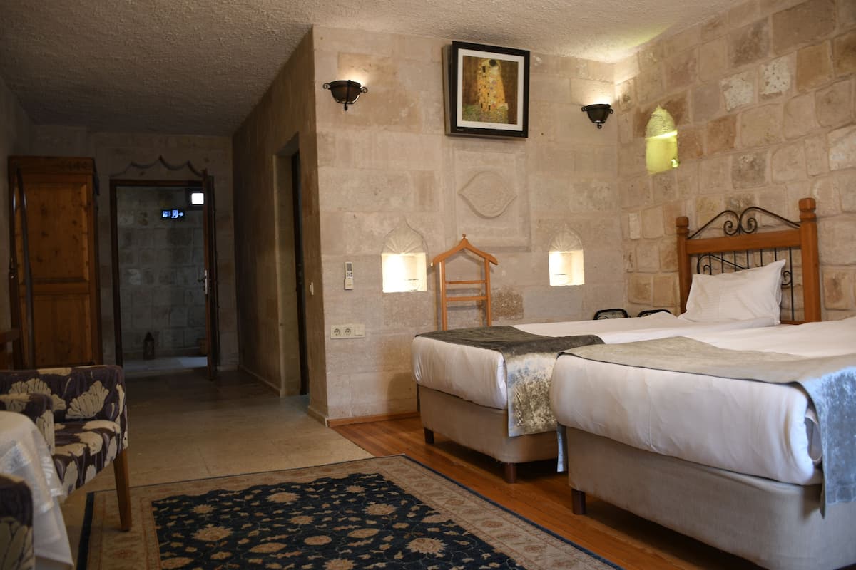 Habitación estándar con 1 cama matrimonial o 2 individuales, para no fumadores, vista al valle | Edredón, camas con pillow-top y caja de seguridad en la habitación