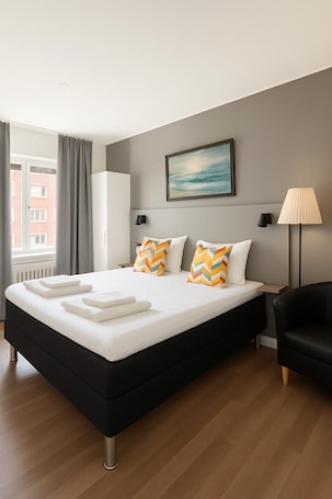 Cortinas blackout, camas plegables/adicionales y wifi gratis