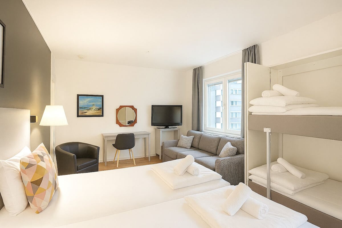 Cortinas blackout, camas plegables/adicionales y wifi gratis