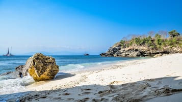 Een privéstrand, duiken, snorkelen, roeien