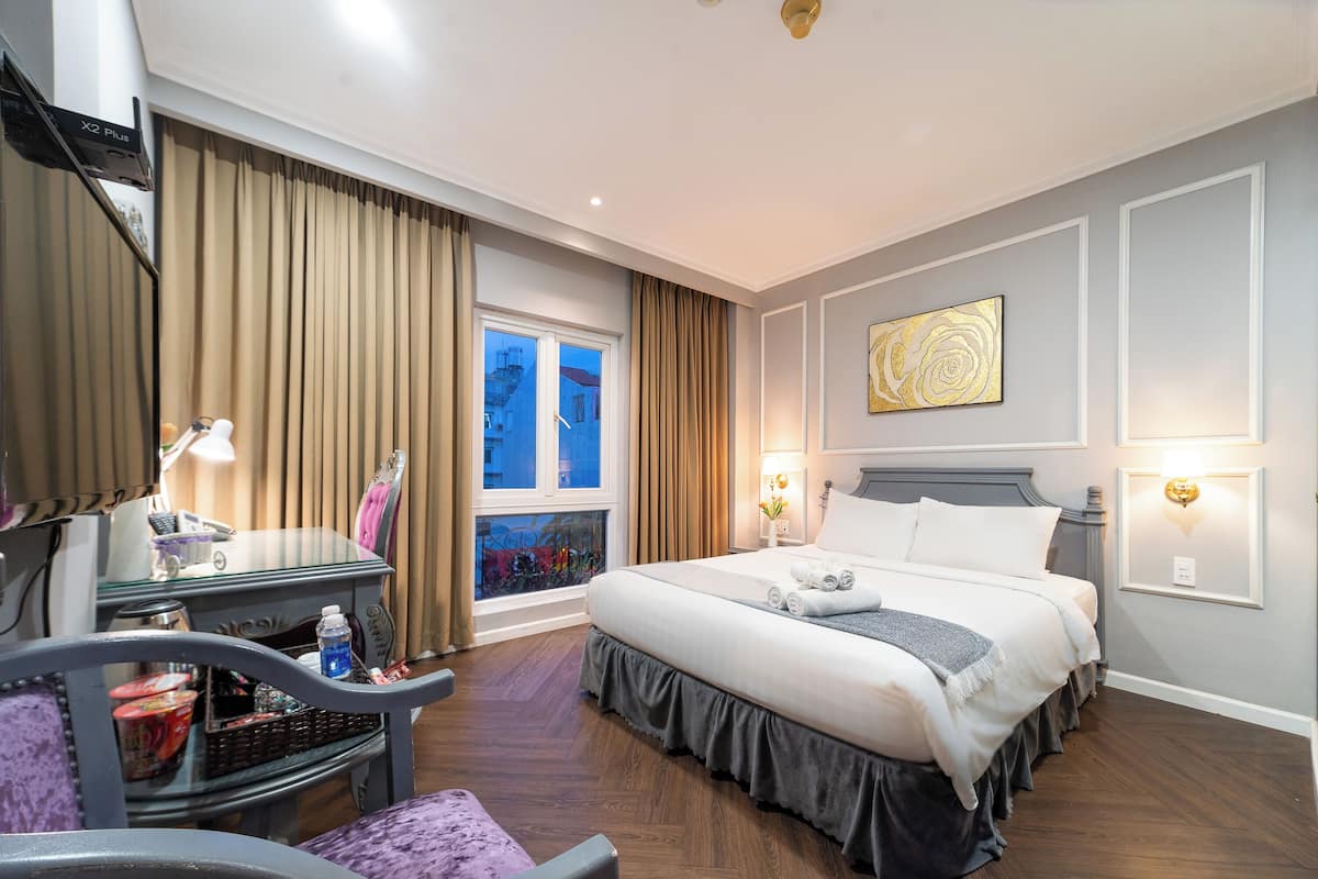 Chambre Deluxe, 1 grand lit | Minibar, bureau, chambres insonorisées, Wi-Fi gratuit