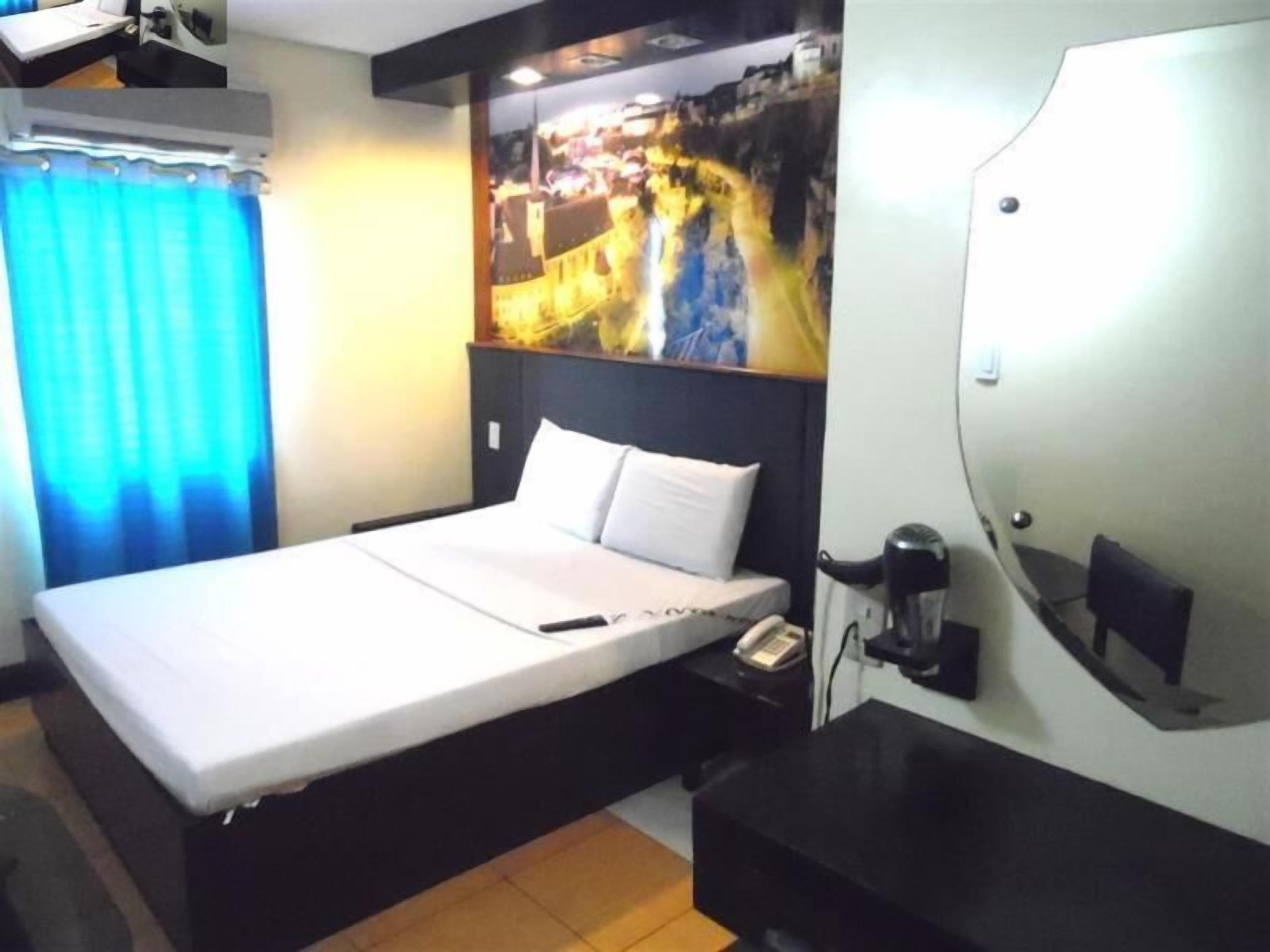 In-room safe, desk, iron/ironing board, rollaway beds