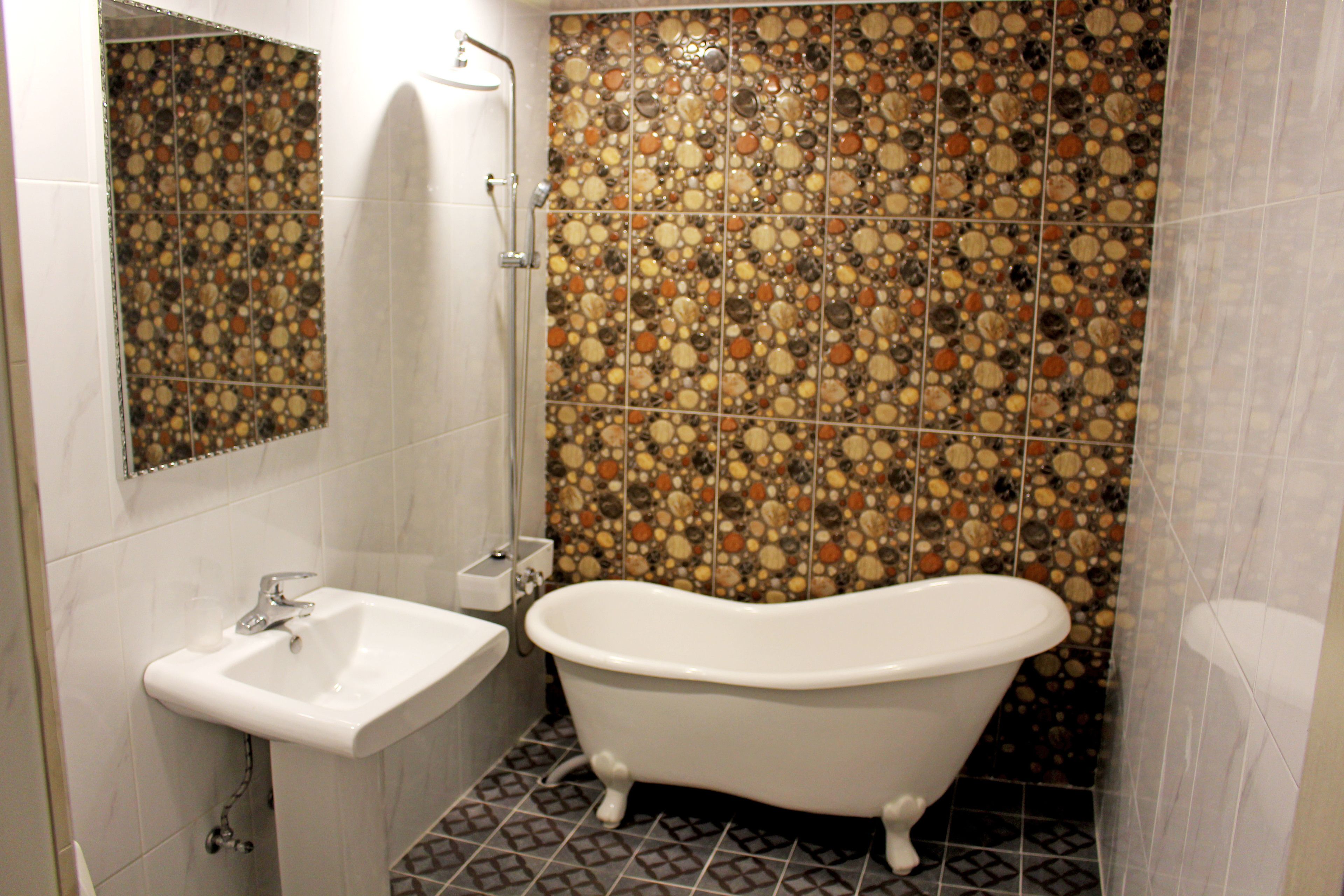 deluxe double room | bathroom | shower, free toiletries, hair dryer, bathrobes