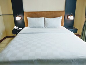 Suíte luxo, 1 quarto | Roupas de cama premium, cofres nos quartos, individualmente mobiliados