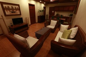 Presidential Suite, 1 King Bed | Living area | 21-inch TV with cable channels - Java Hotel (Laoag)