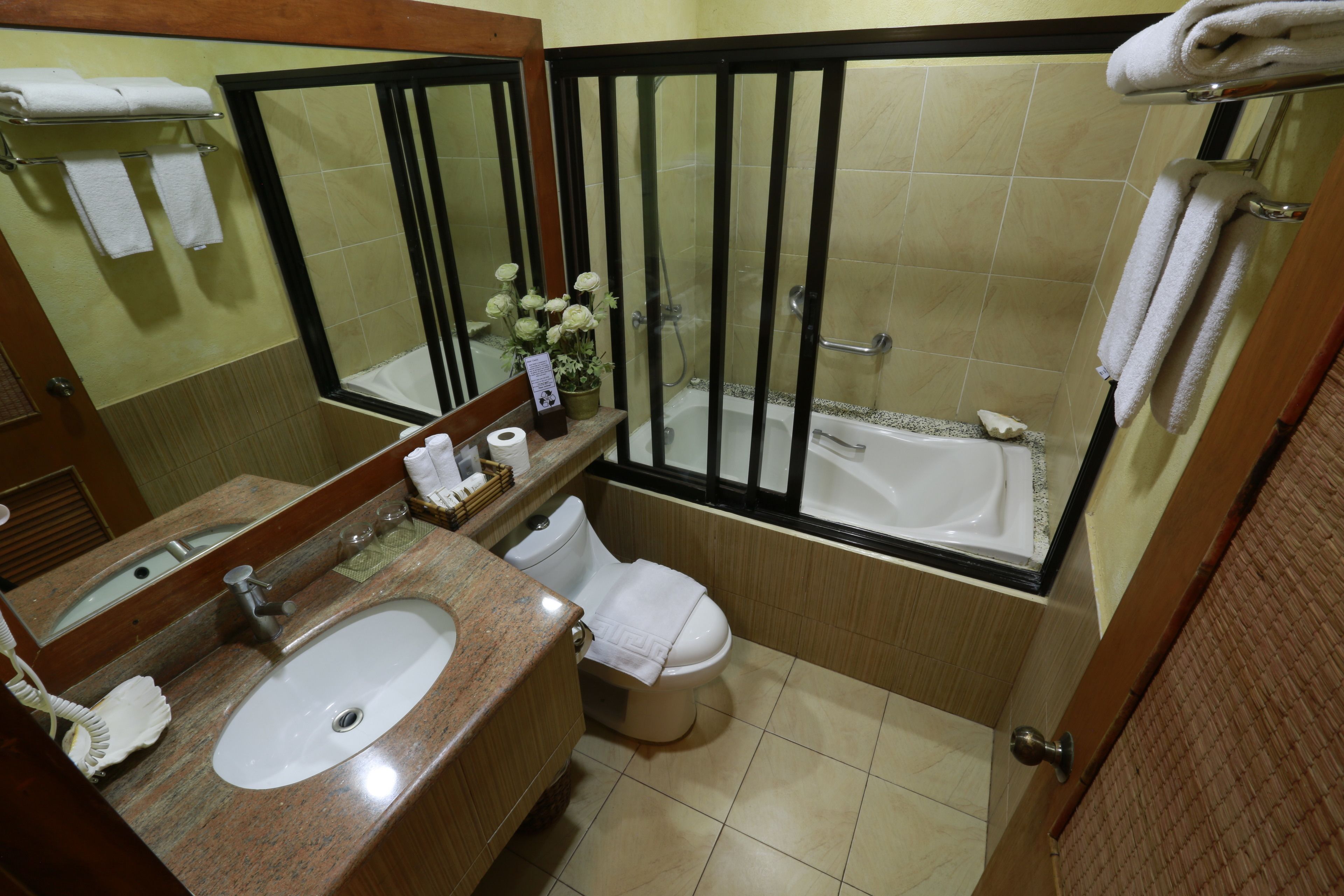 junior suite, 1 queen bed | bathroom | free toiletries, hair dryer, towels, soap