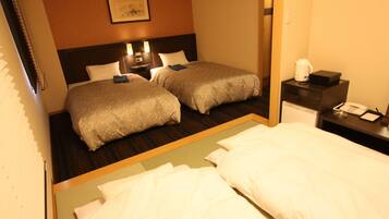 Down comforters, desk, free WiFi, bed sheets