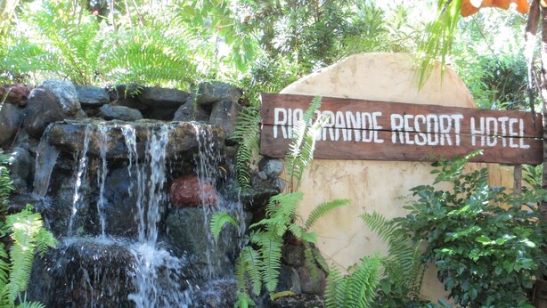 A sign for Rio Grande Resort Hotel with a waterfall feature. - Rio Grande de Laoag Resort Hotel (Laoag)