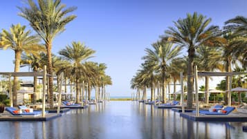 5 outdoor pools, pool umbrellas, pool loungers