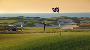 Golfers can enjoy a scenic round with ocean views from the course.