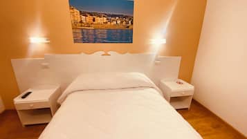 Economy kamer | Luxe beddengoed, verduisterende gordijnen, gratis wifi, beddengoed