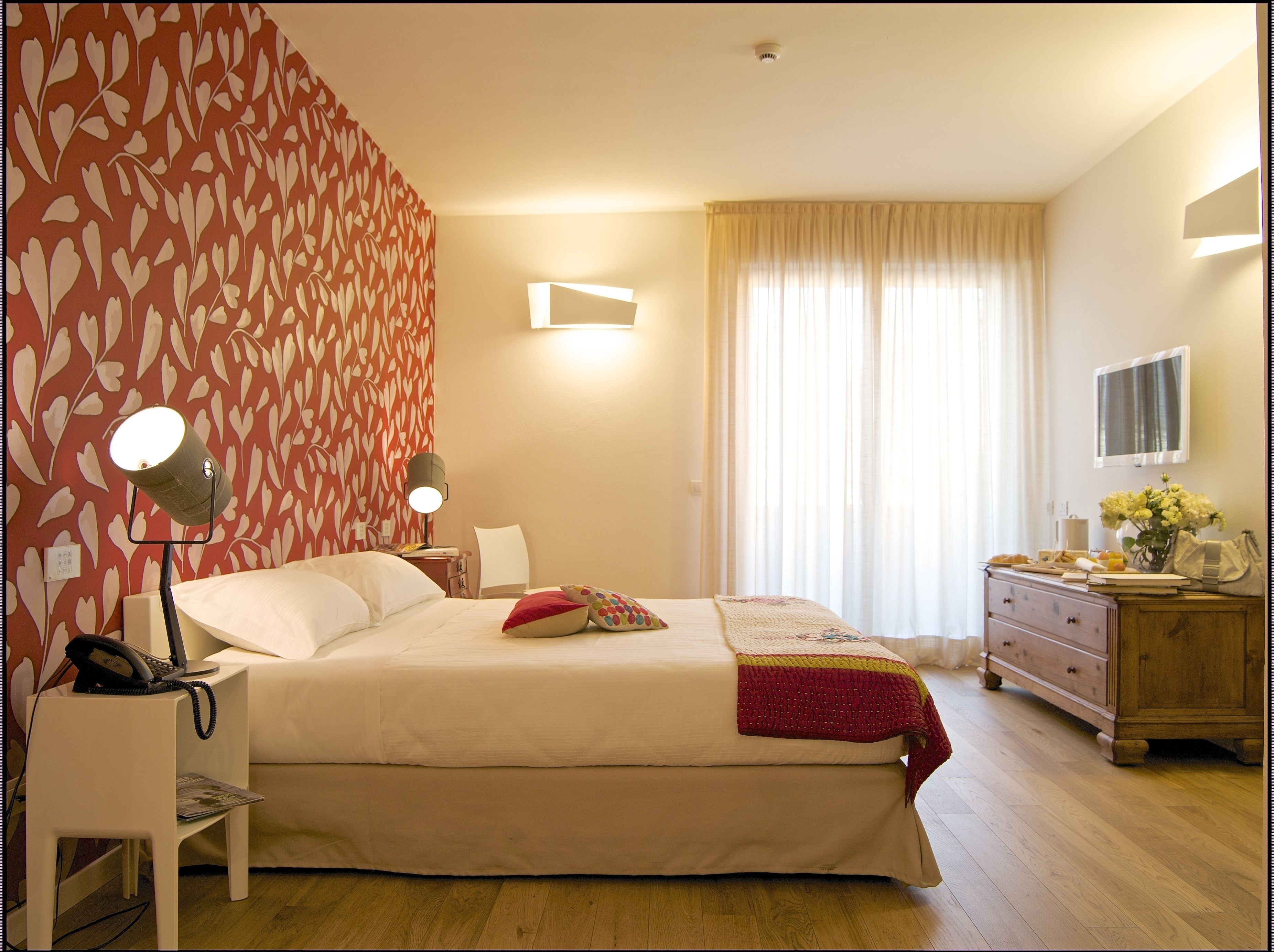 premium bedding, down duvets, minibar, in-room safe